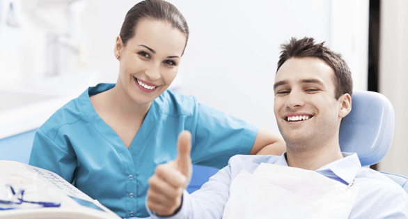 Man Giving Thumbs Up — Cosmetic Dentistry In Liverpool, NY