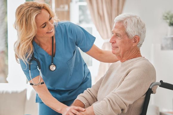 Nurse providing compassionate care to elderly man at Clearstream Rehab & Nursing Center
