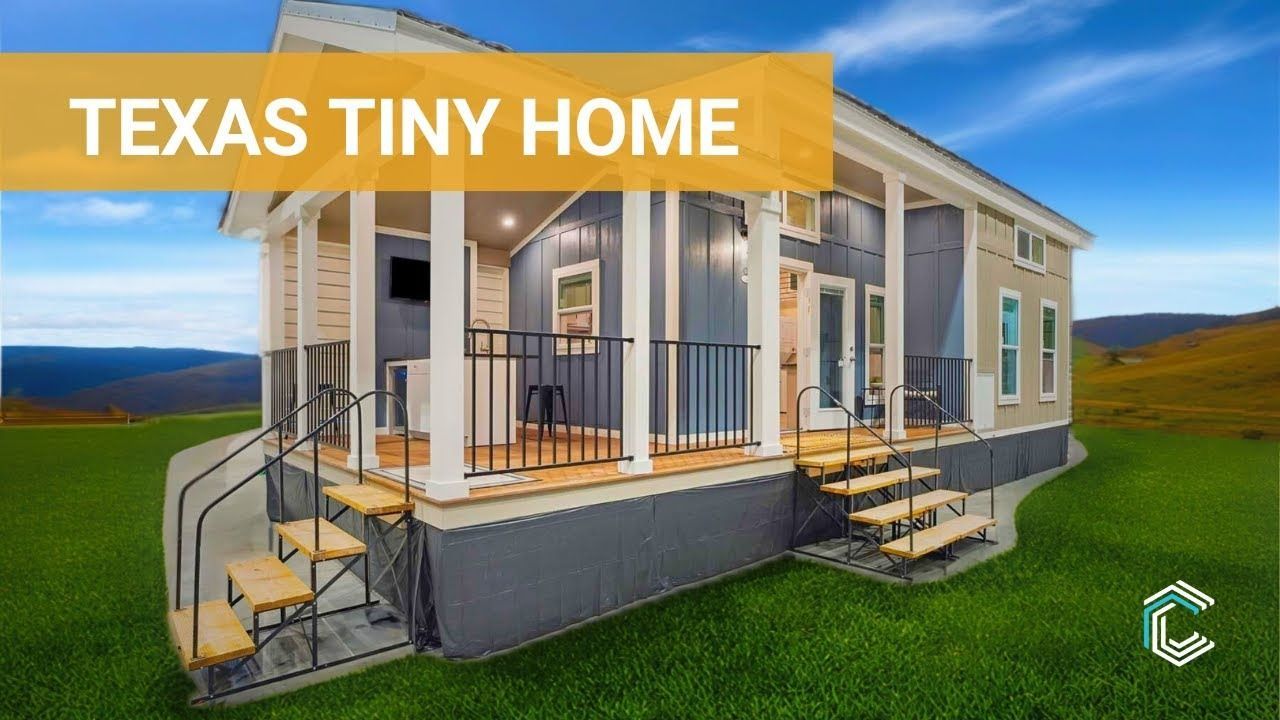 Texas tiny home on a green hillside under a blue sky