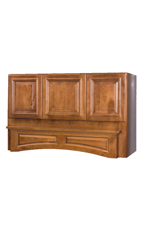A wooden kitchen range hood with a recessed panel design and a curved bottom edge.