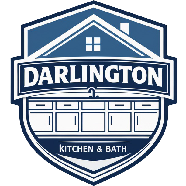 Logo for Darlington Kitchen & Bath featuring a blue and white shield with a house outline and kitchen cabinets.