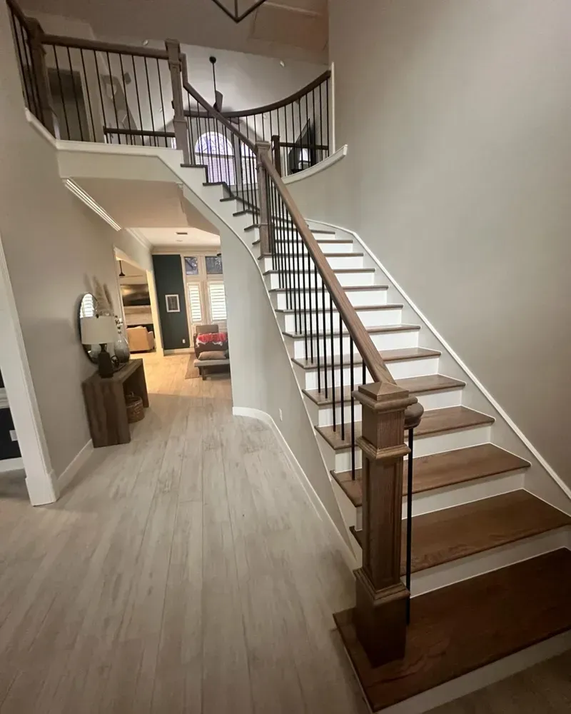 A staircase leading up to a second floor in a house.