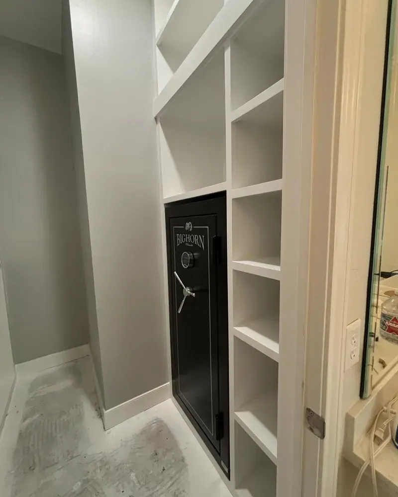 There is a safe in the corner of the room.