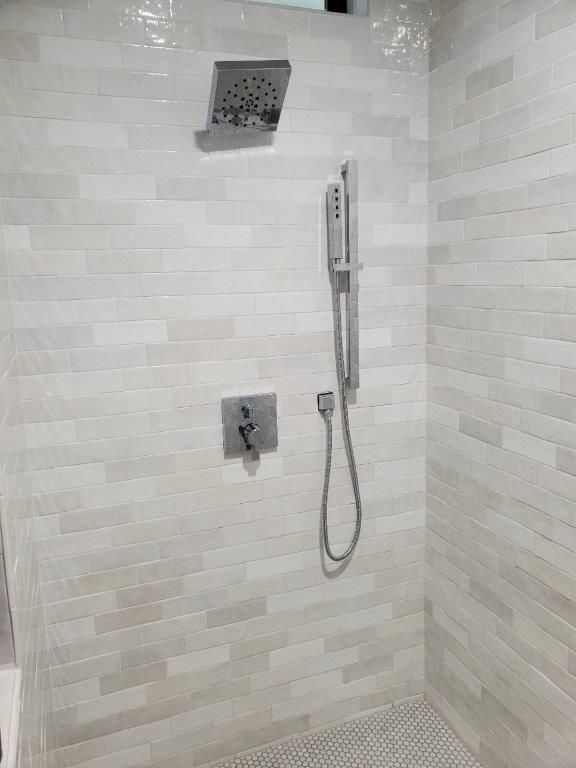 Shower With White Tiles