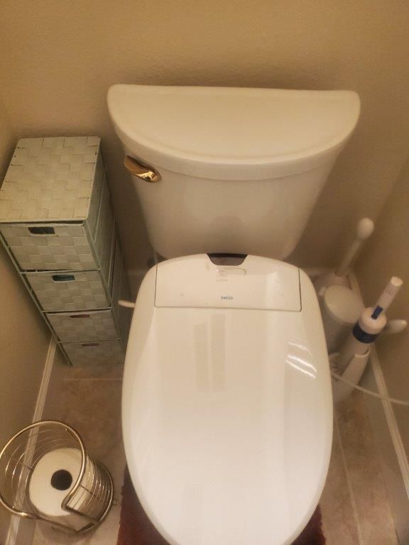 Toilet With Toilet Paper Bucket