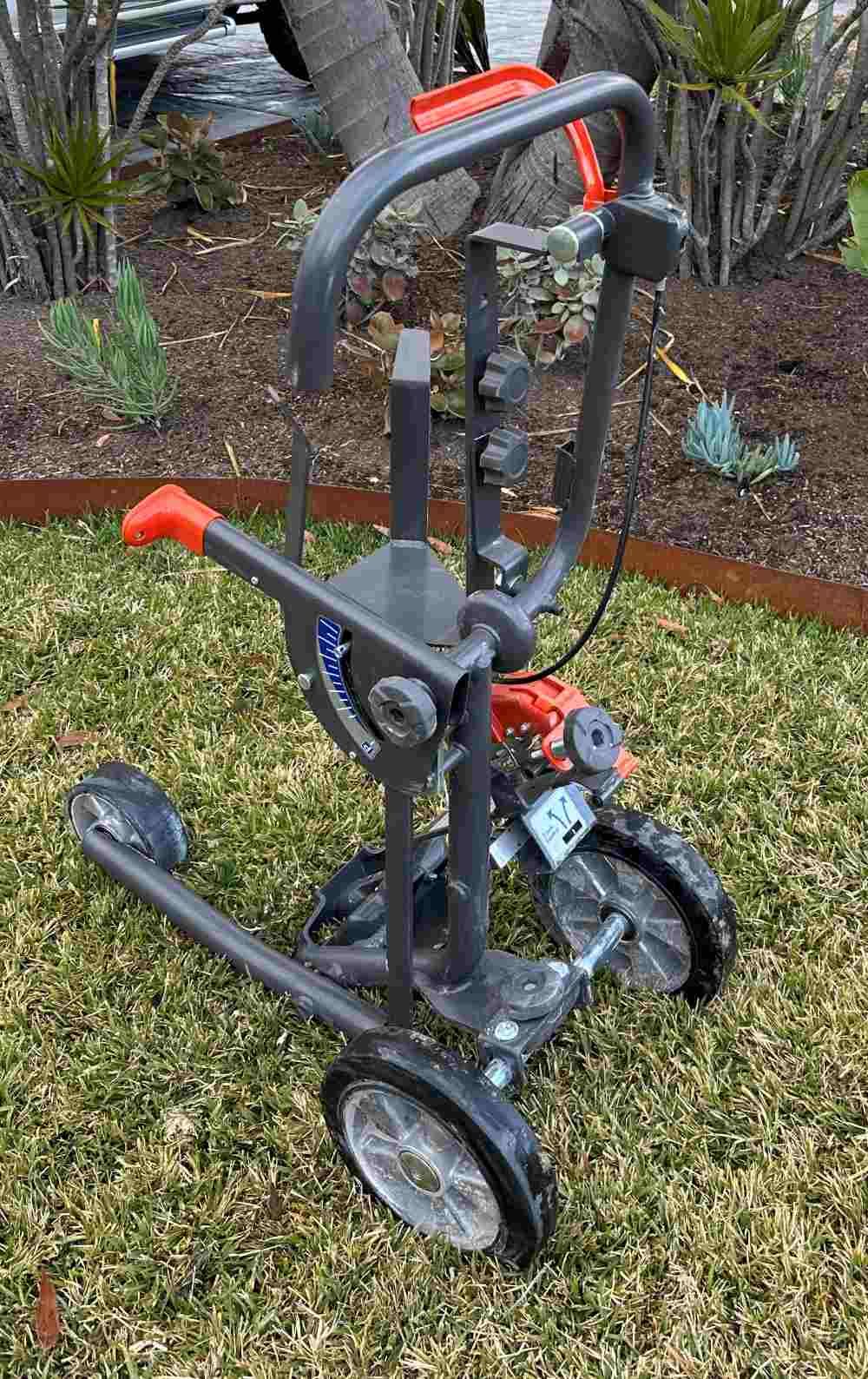 A Walker is Sitting on Top of a Lush Green Lawn — Garrett's Excavation & Equipment Hire in Sanctuary Point, NSW