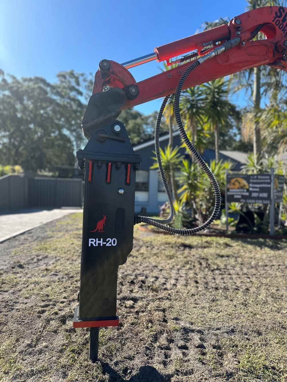 Hydraulic Hammer is Attached to a Crane — Garrett's Excavation & Equipment Hire in Sanctuary Point, NSW