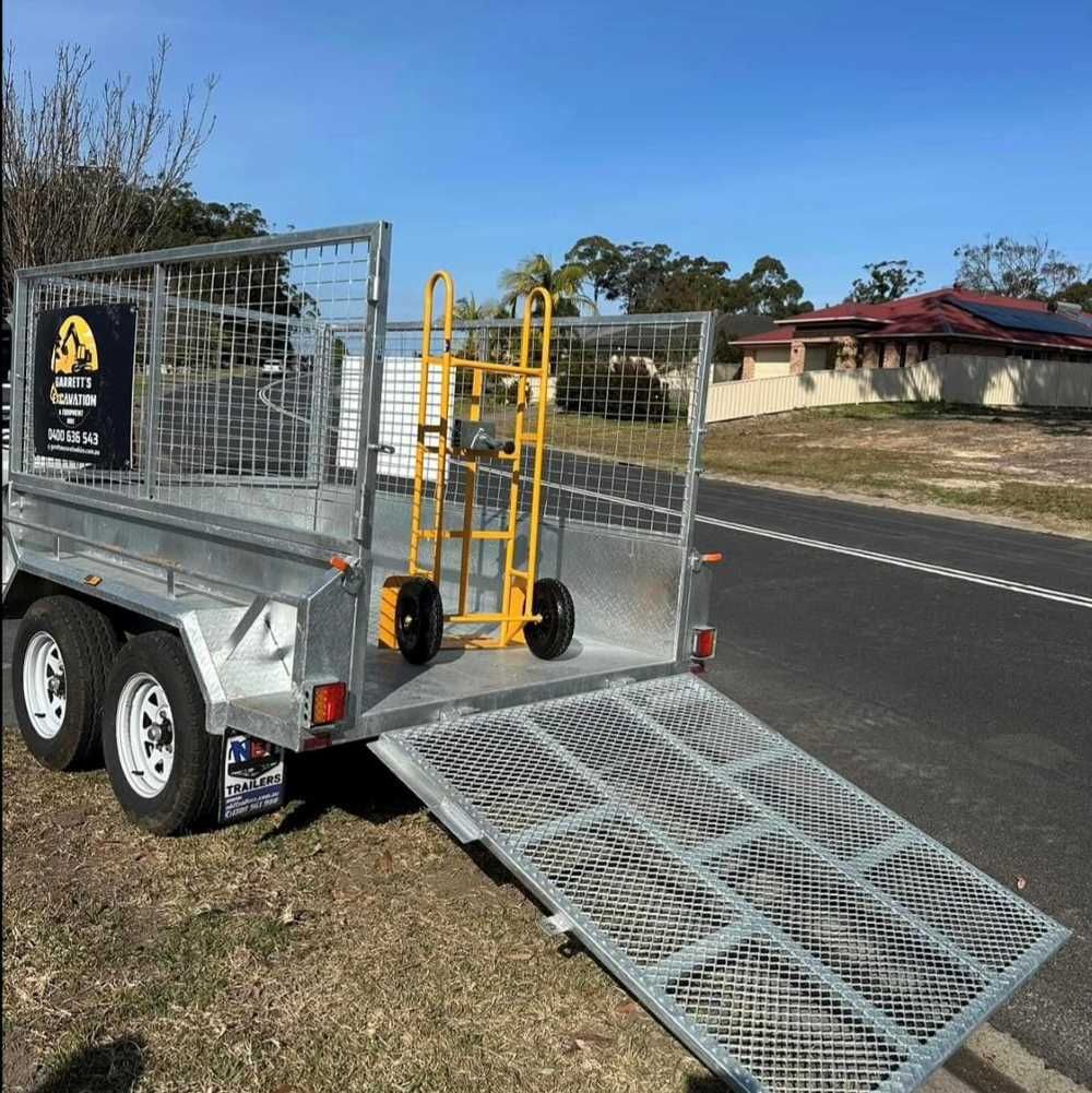 A Trailer is Parked on the Side of the Road — Garrett's Excavation & Equipment Hire in Sanctuary Point, NSW
