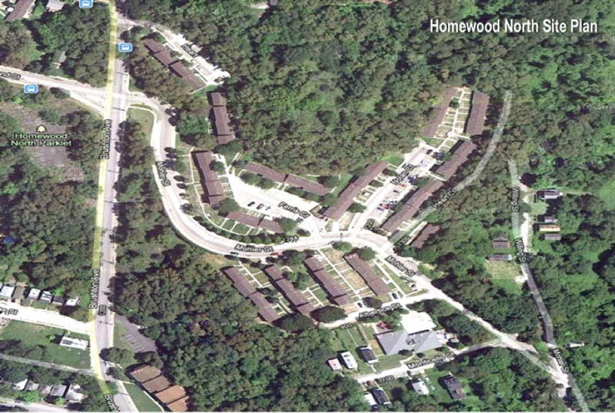 an aerial view of a residential area surrounded by trees and houses .