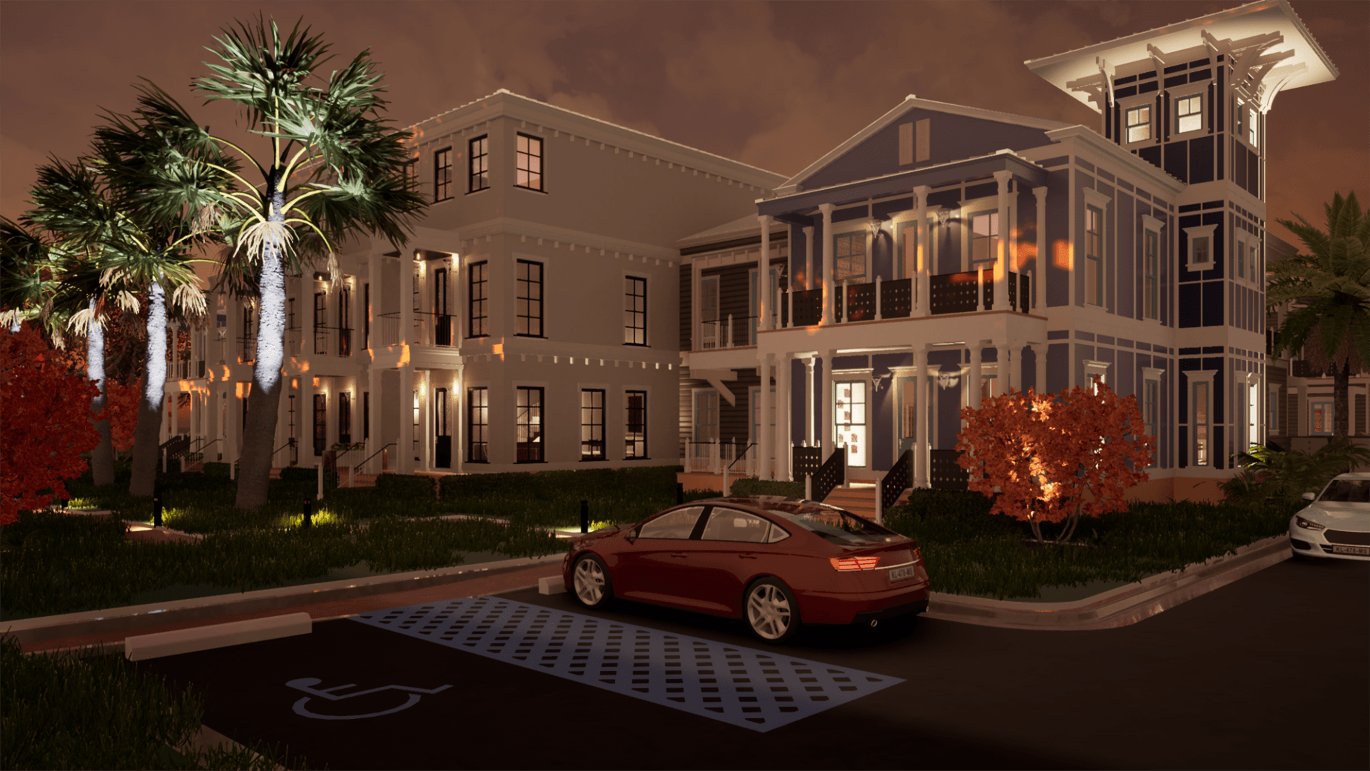 a red car is parked in front of a large building at night .