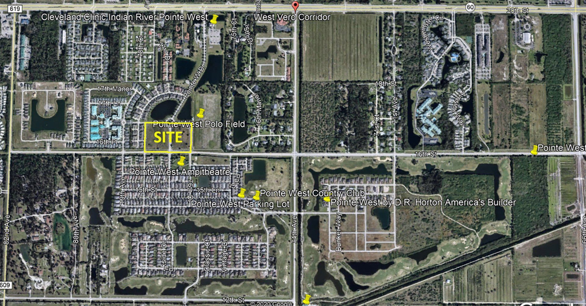 an aerial view of a residential area with a yellow arrow pointing to the site .