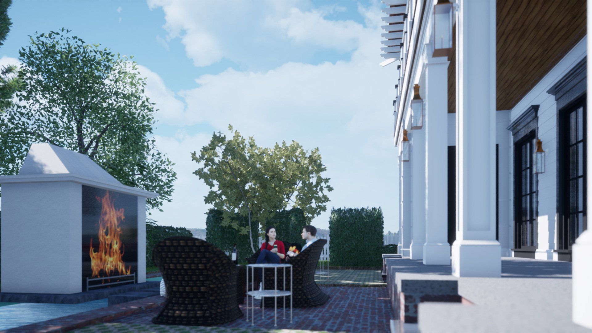 a group of people are sitting on a patio next to a fireplace .