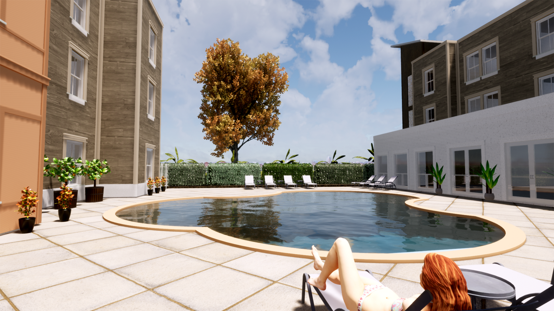 a woman is laying on a lounge chair next to a large swimming pool .