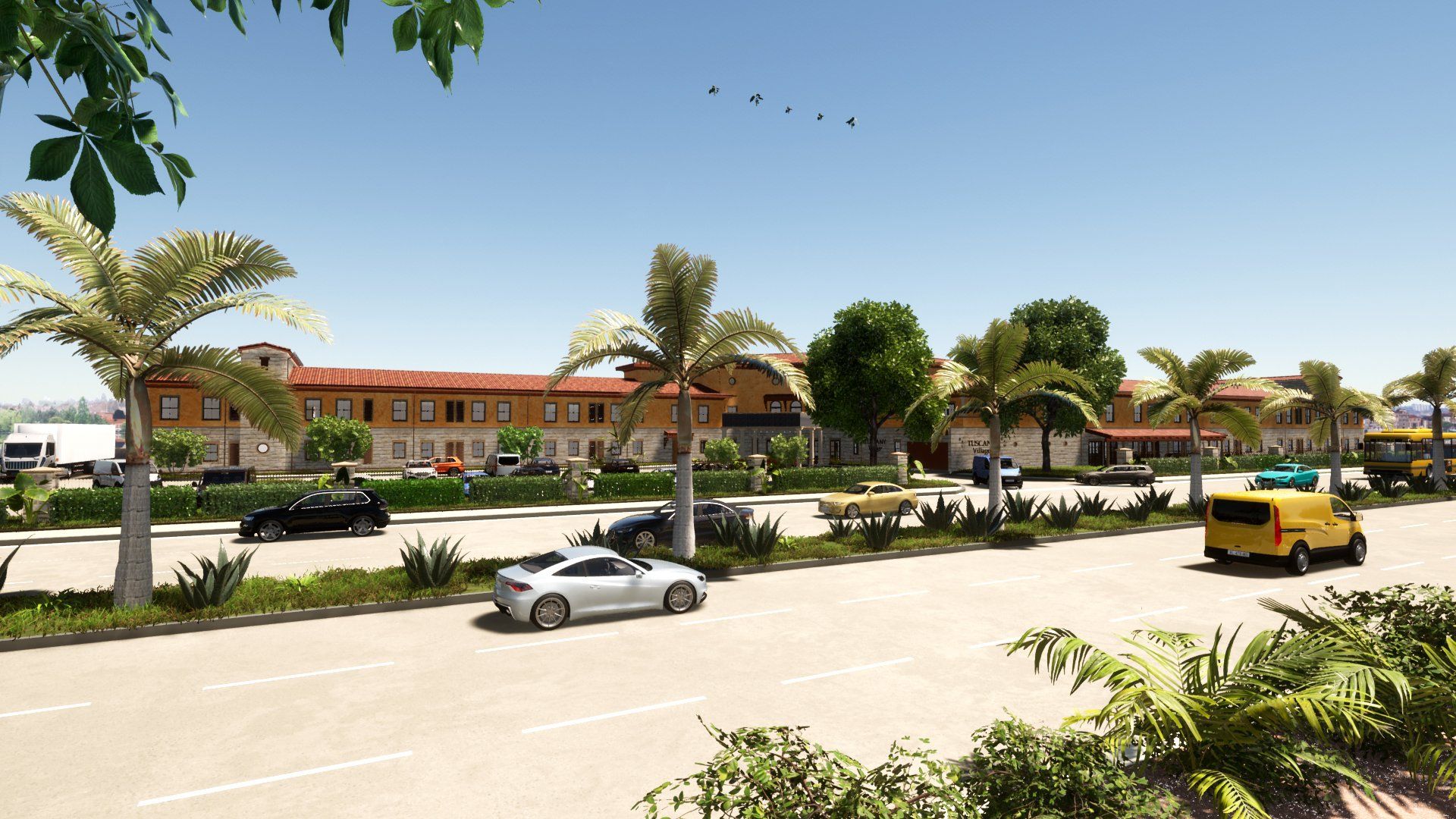 cars are driving down a street in front of a building