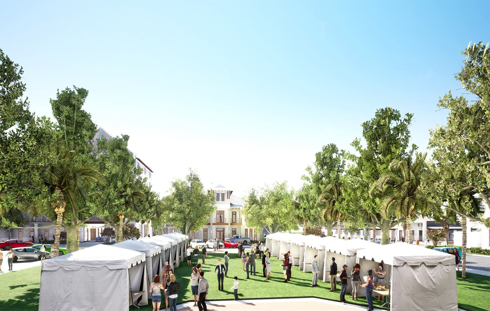 a group of people are standing in a park with tents and trees .