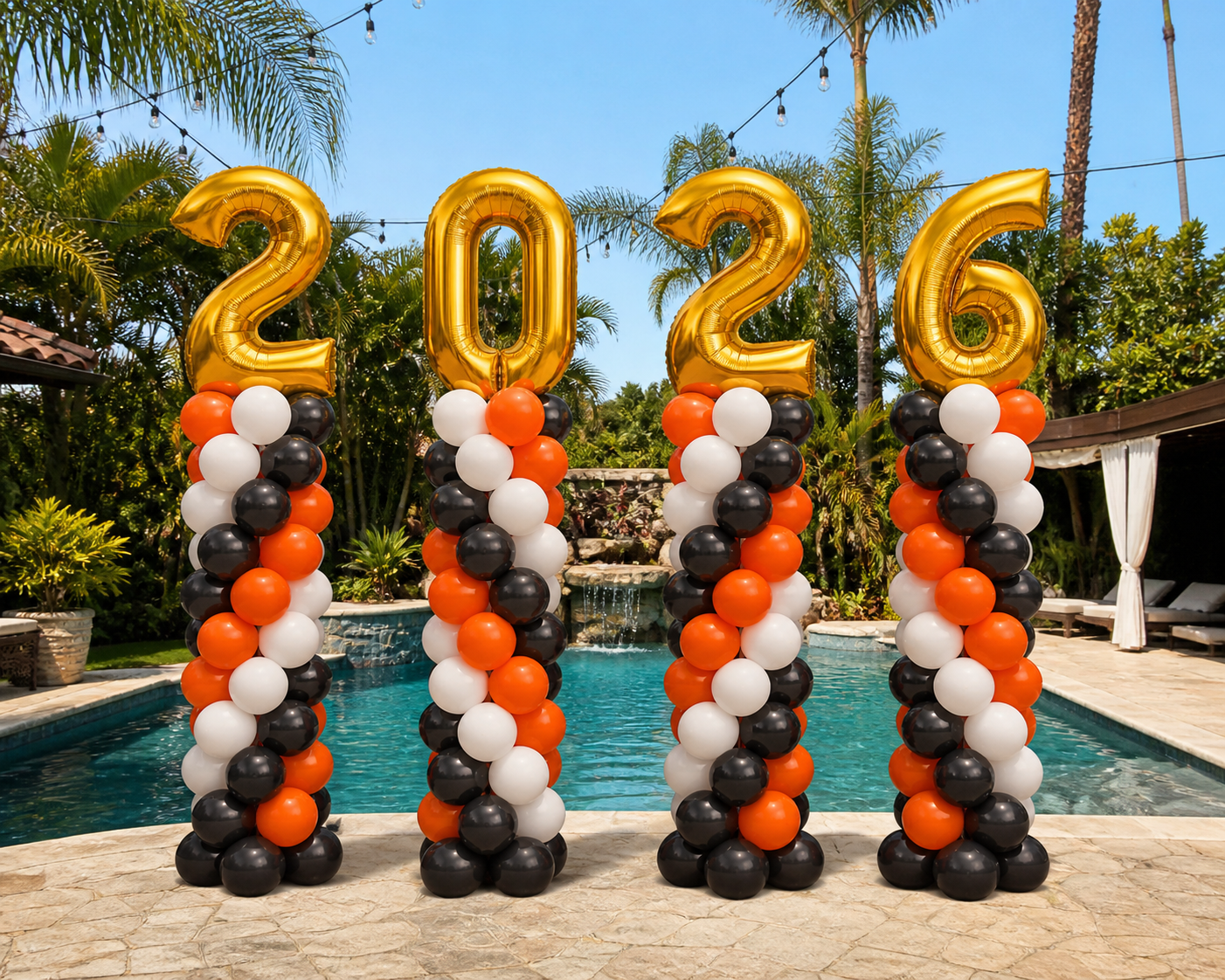 Graduation balloon columns in school colors for outdoor celebration