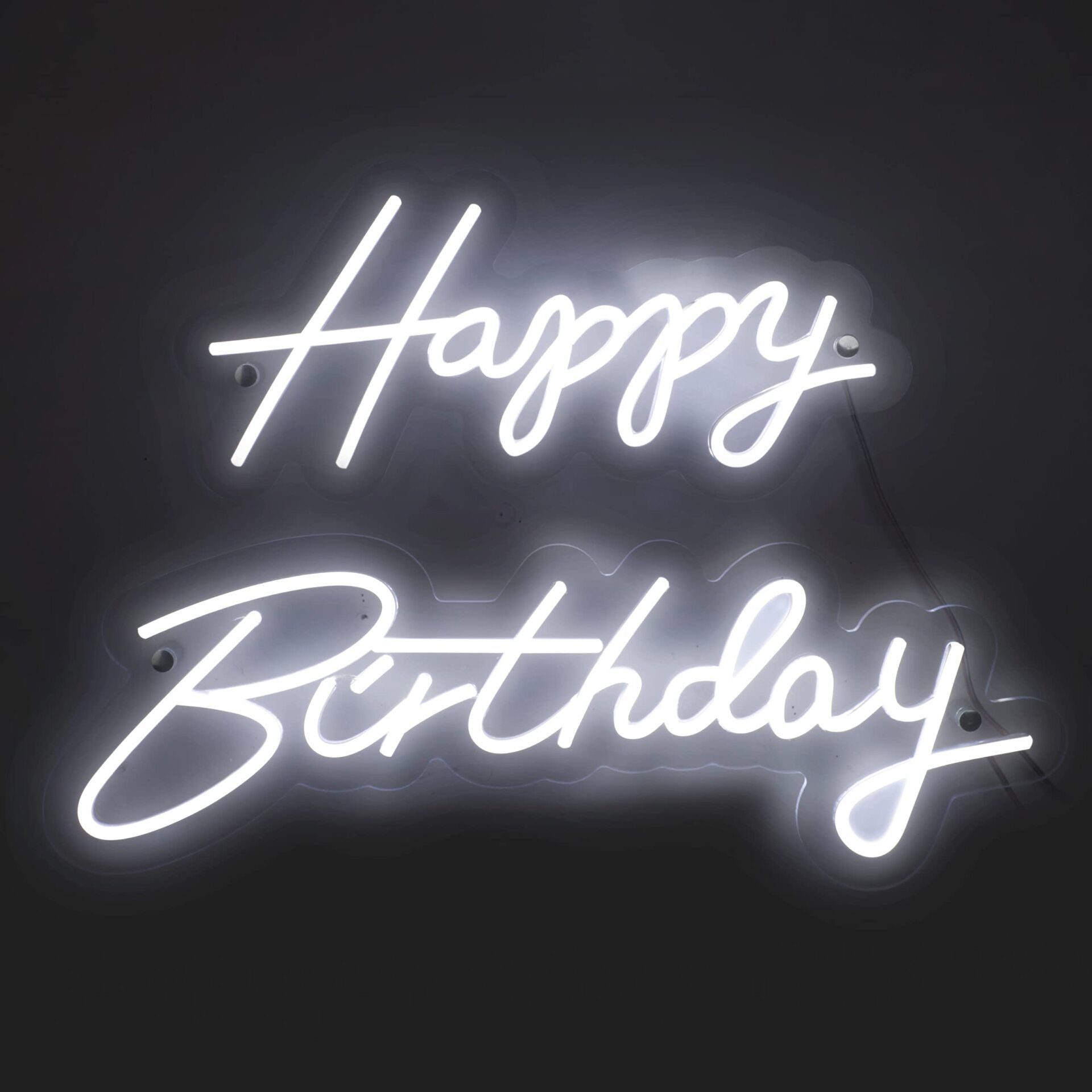 A neon sign that says happy birthday on a black background