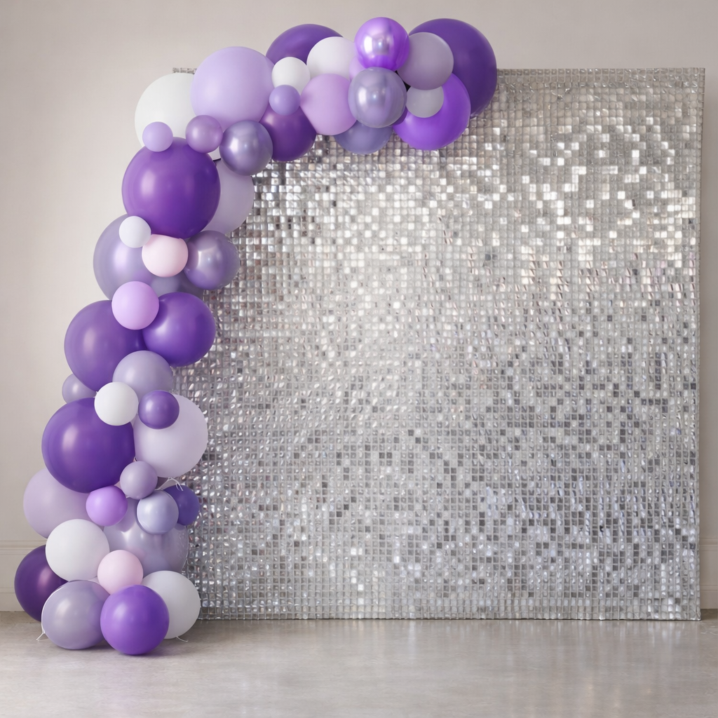 A silhouette of a woman standing in front of purple balloons