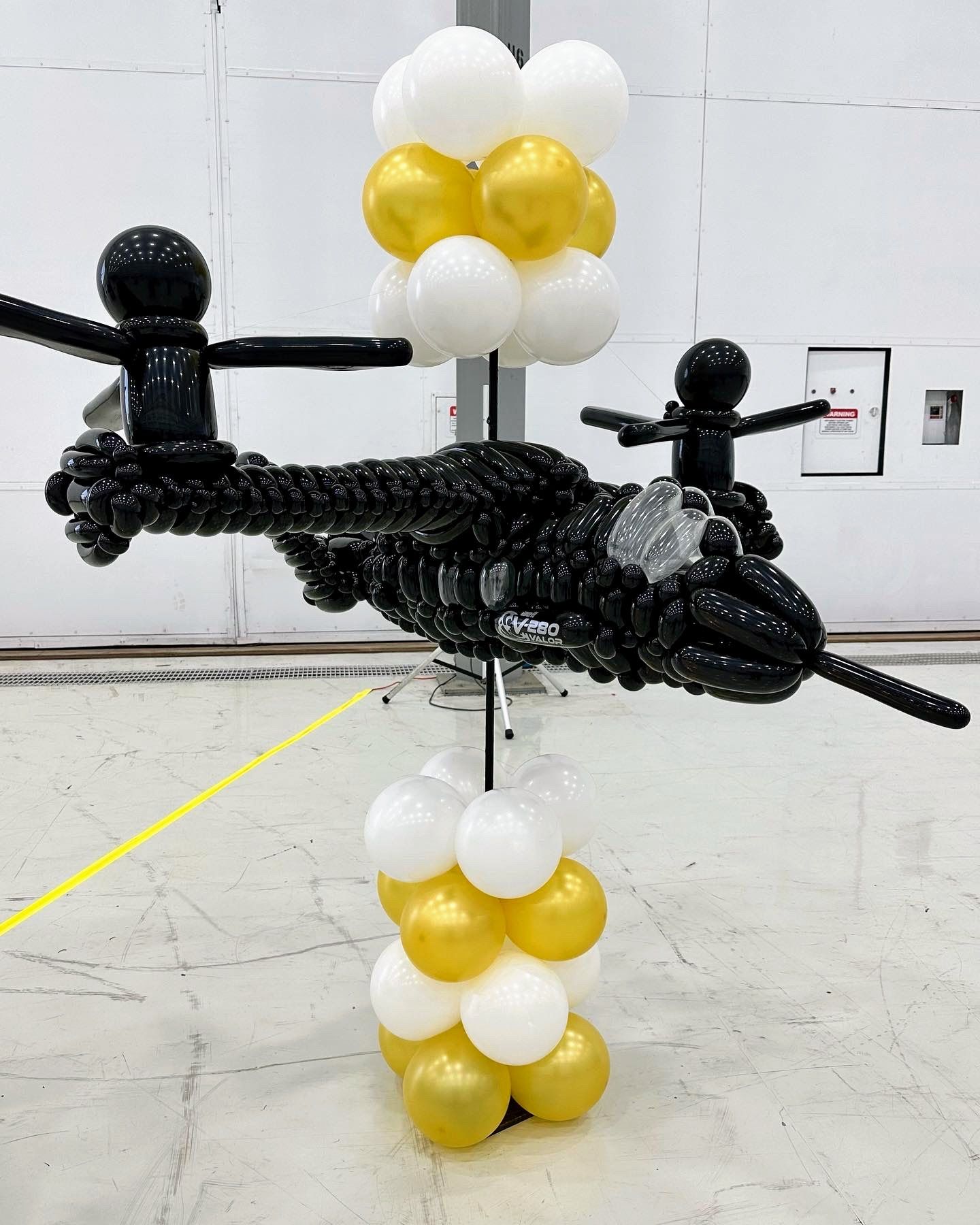 A helicopter made out of balloons is on display
