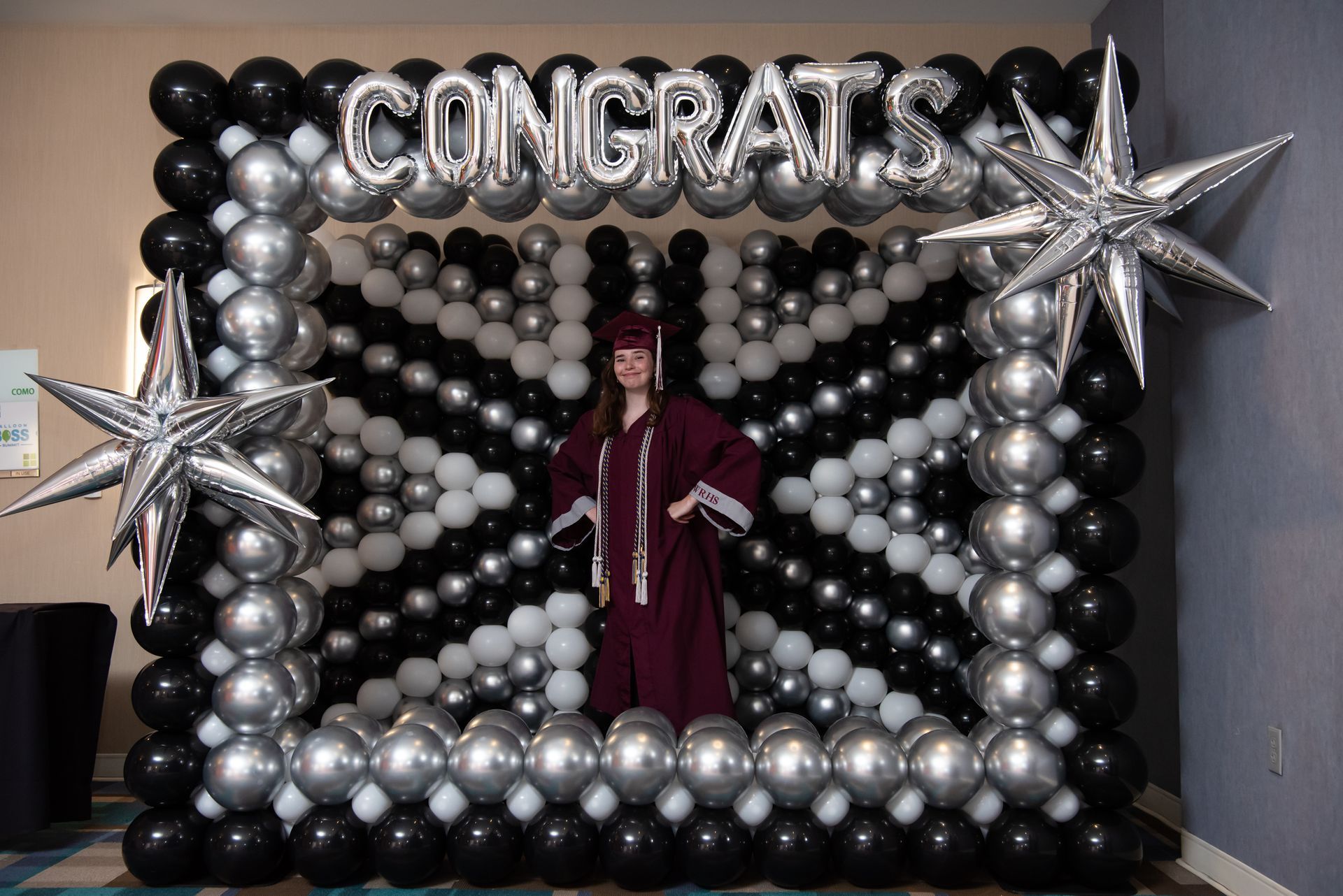 Graduation balloon backdrop with congrats sign and balloon wall for Fort Worth event decor