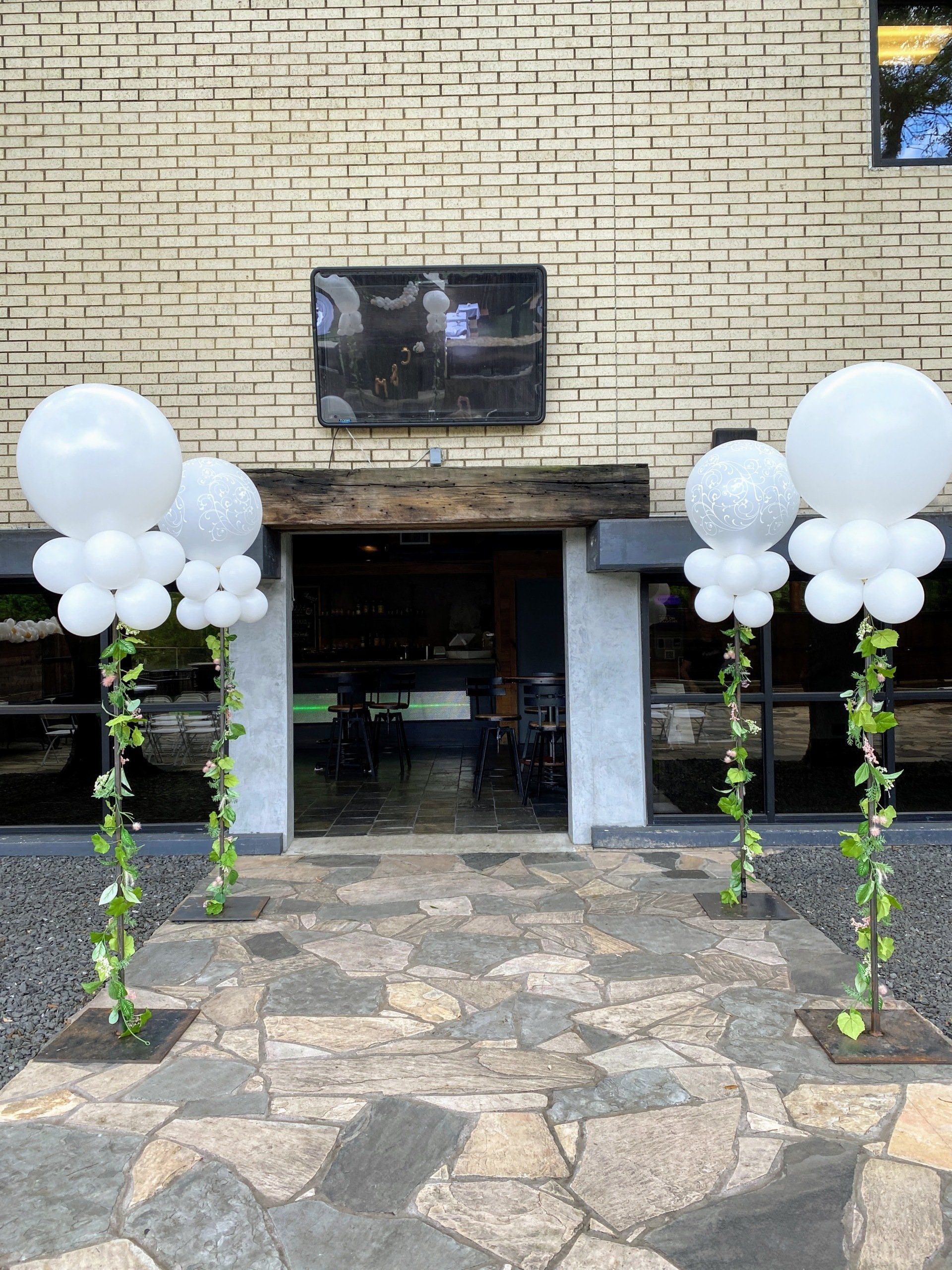 A building with a lot of balloons in front of it