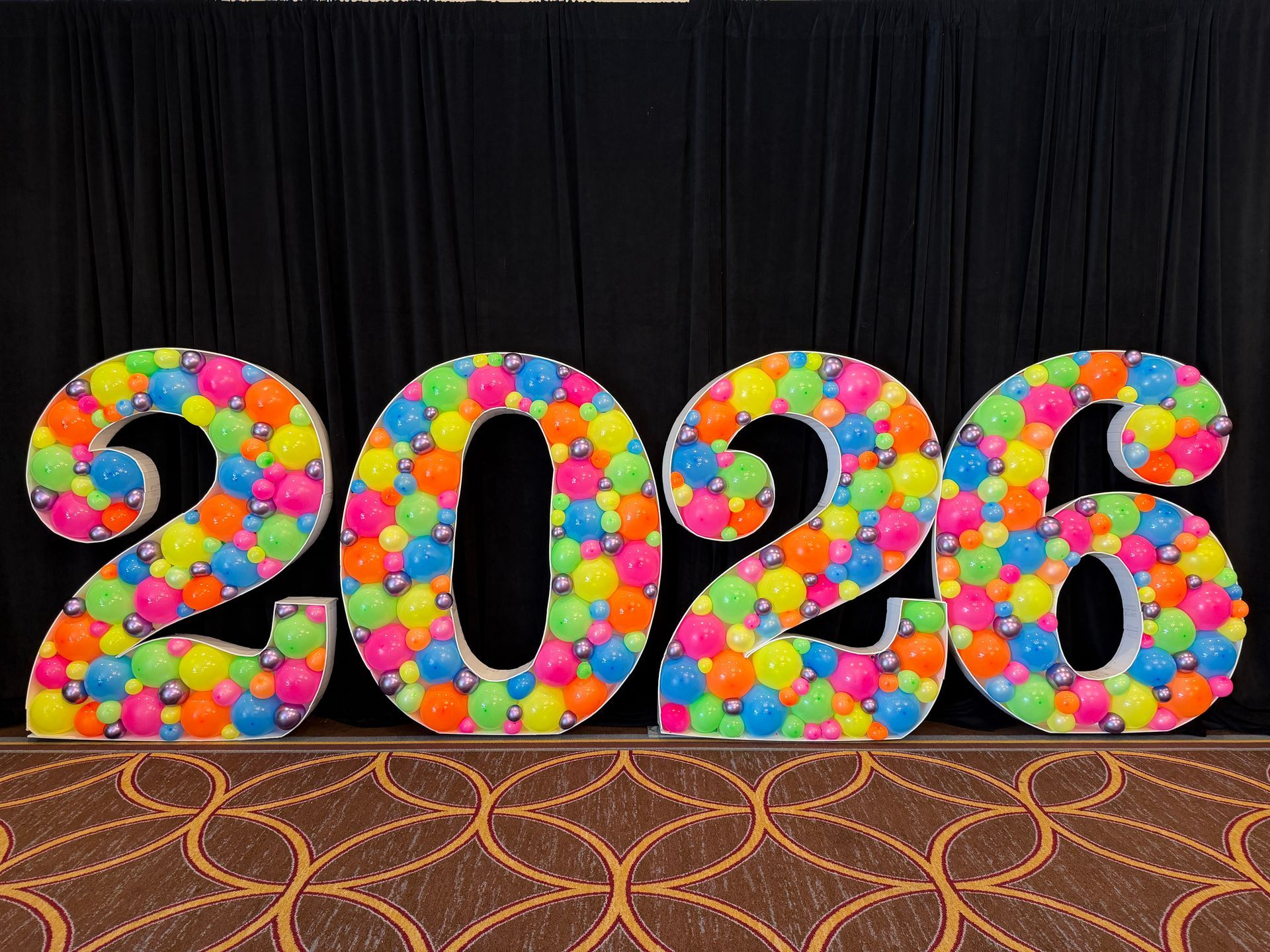 Balloon mosaic numbers 2026 in colorful design for graduation party decor in Fort Worth