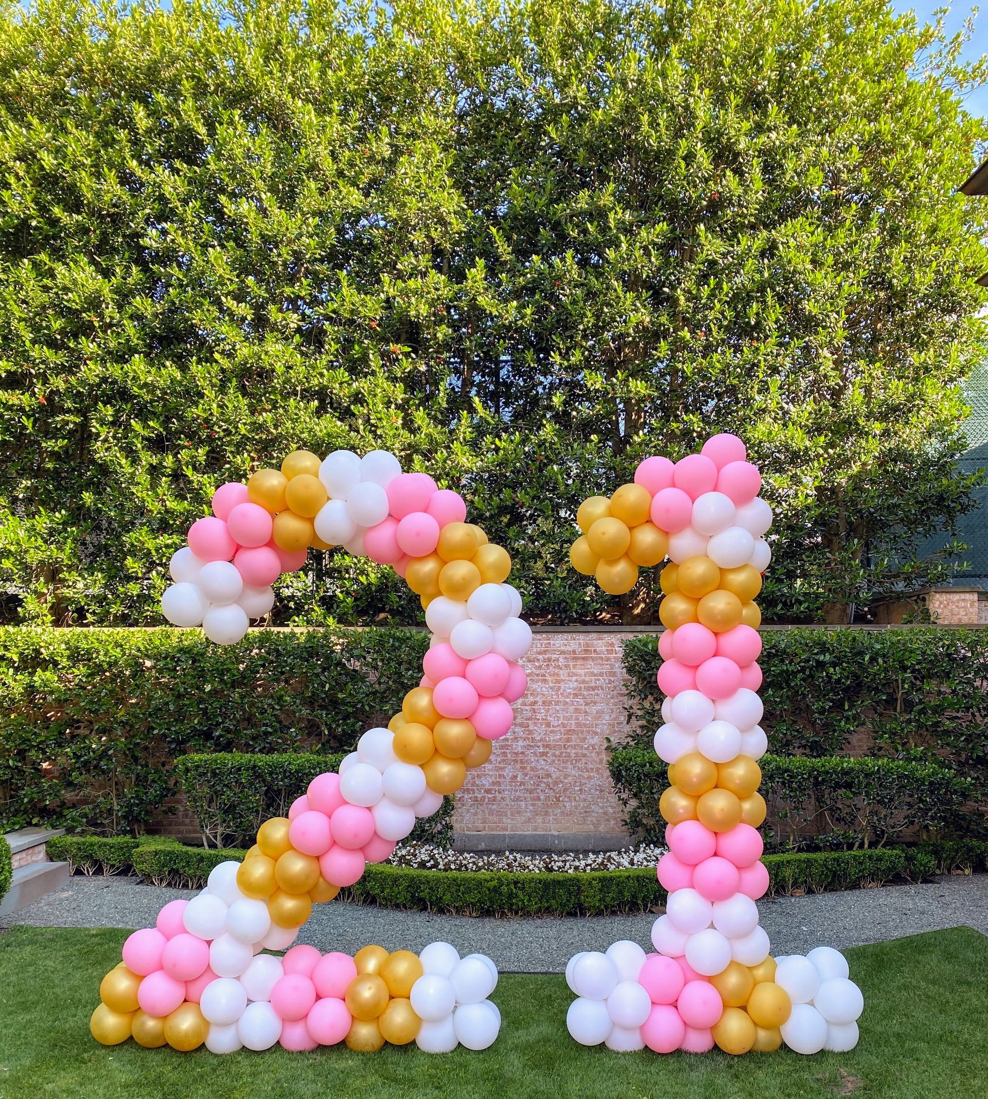 A large, colorful balloon display featuring the numbers 