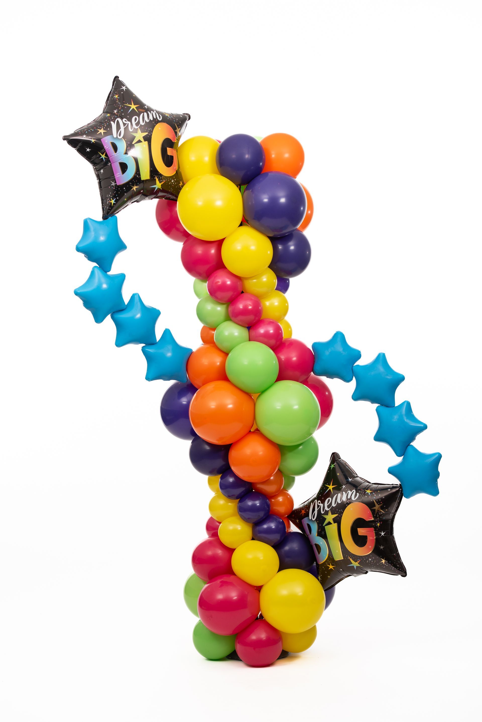 A bunch of colorful balloons are stacked on top of each other on a white background.