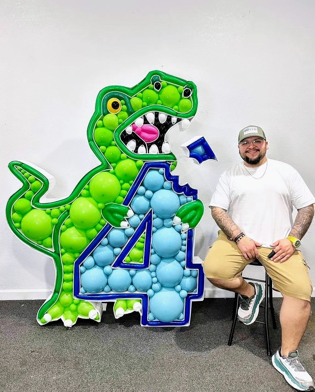 Dinosaur balloon mosaic sculpture for kids birthday party decor in Fort Worth Texas