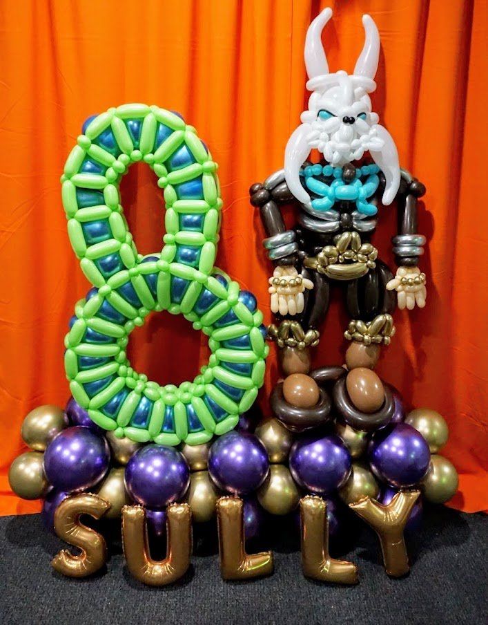 A skeleton made out of balloons with the name sully