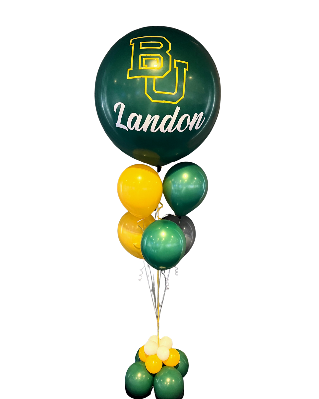 A Baylor University-themed balloon bouquet featuring a large dark green balloon prominently displaying the yellow BU logo and the personalized name 