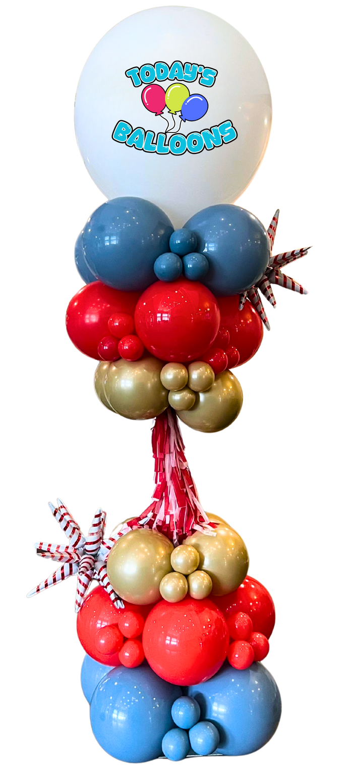 A black , white , and blue balloon display with a black balloon in the middle.