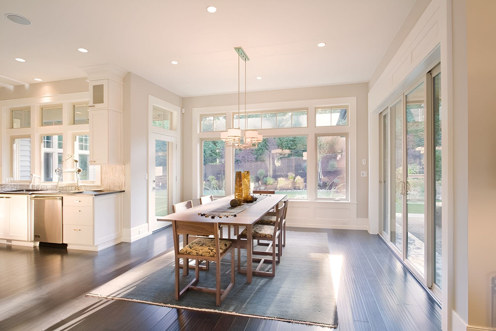 A Man Is Kneeling Down On The Floor Using A Tool — Salt Building & Pest Inspections in Reedy Creek, QLD
