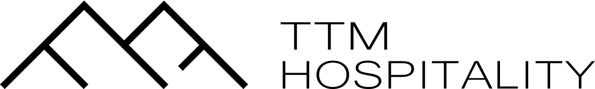Black and white minimalist mountains logo. Two peaks connected with bold lines.