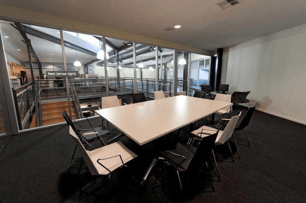 A Conference Room With a Long Table and Chairs — Kymar Steel Fabrications in Teralba, NSW