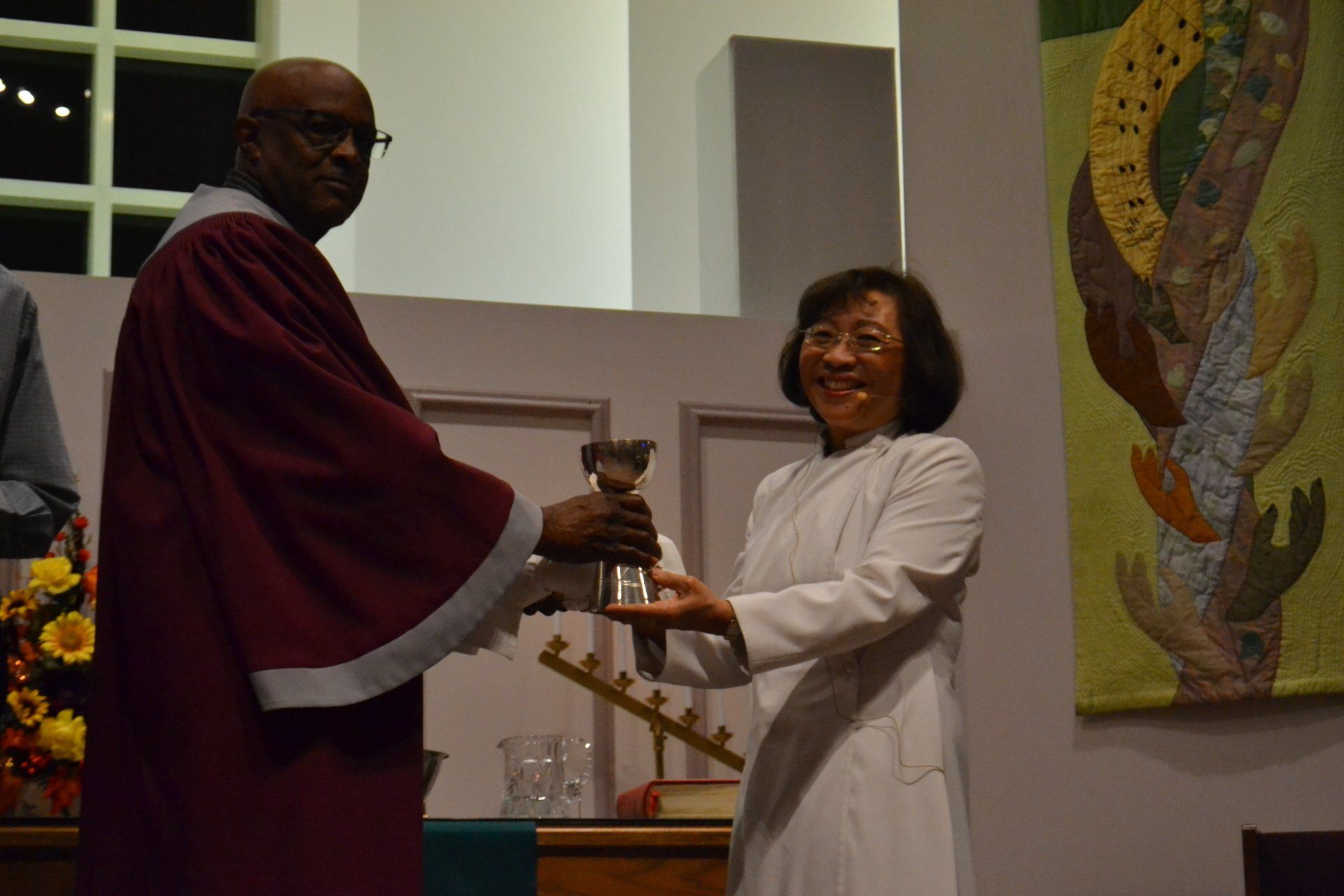 Ritual of receiving the chalice -Photo Credit: Evelyn Butler