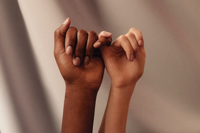 Two People Are Making a Pinky Promise with Their Hands — Rejuved in Bateau Bay, NSW