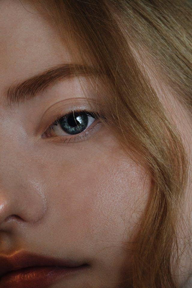 A Close up Of a Woman 's Face with A Blue Eye — Rejuved in Bateau Bay, NSW