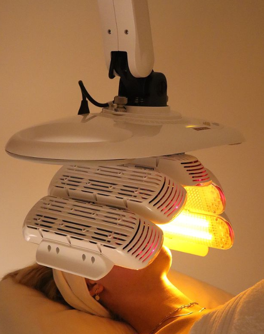 A Woman Is Getting a Light Treatment on Her Face — Rejuved in Bateau Bay, NSW