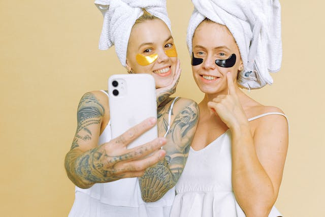 Two Women with Towels Wrapped Around Their Heads Are Taking a Selfie — Rejuved in Bateau Bay, NSW