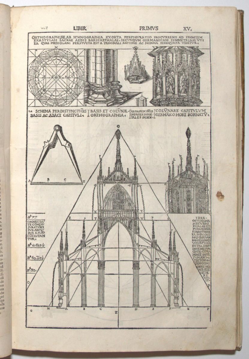 A book is open to a page with drawings on it
