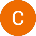 A white letter c in an orange circle on a white background.