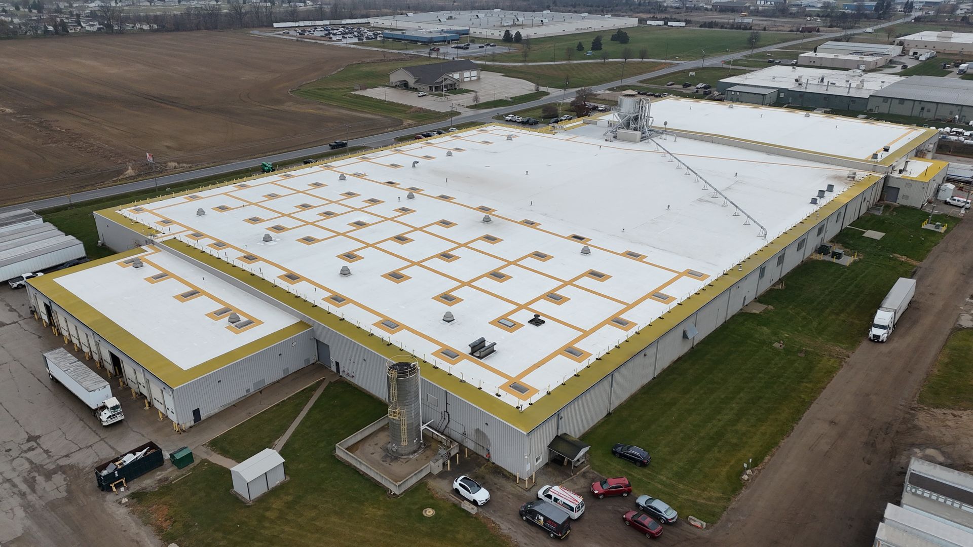 roof coating system installed over existing PVC roof
