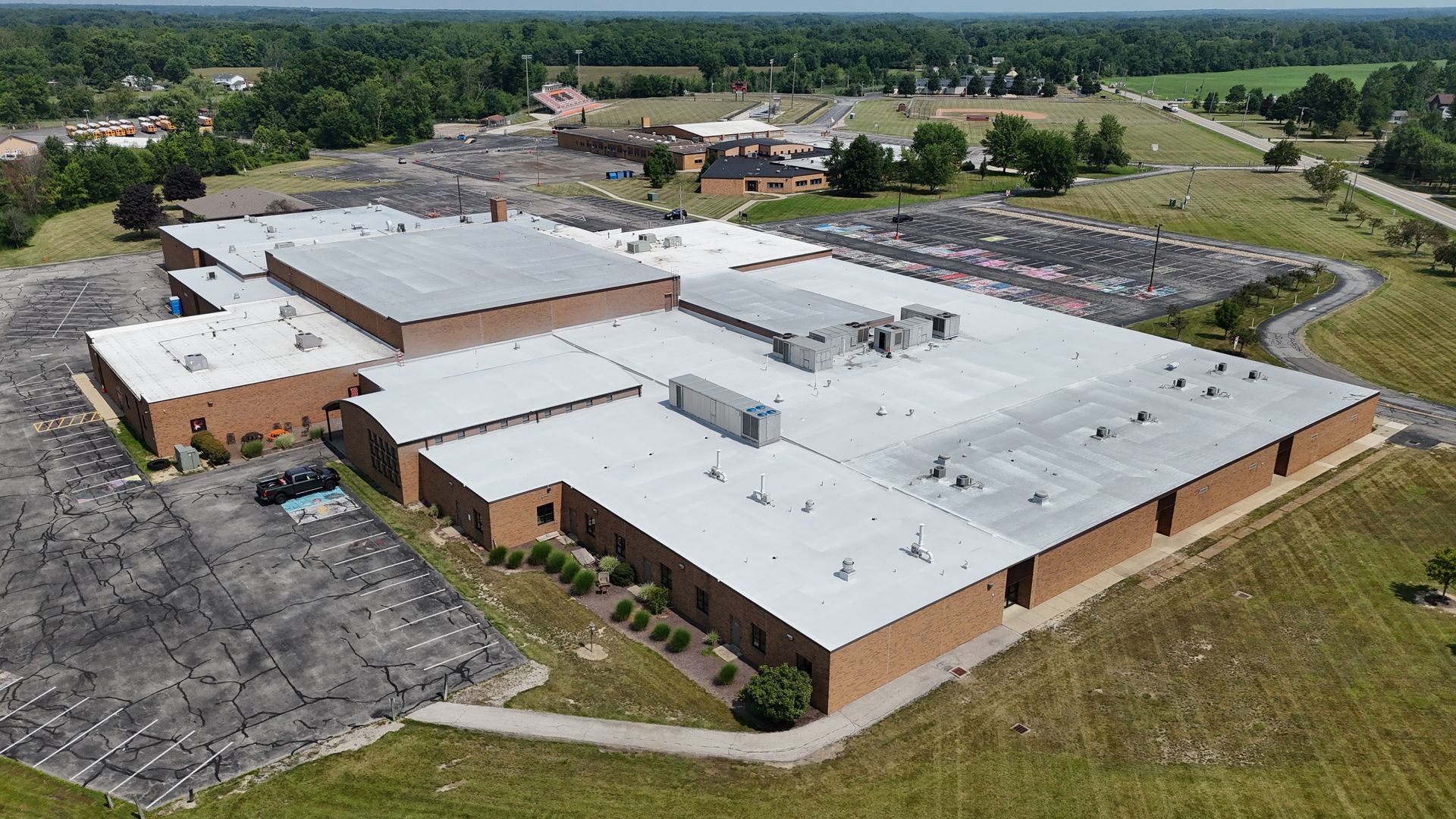 Finished spray foam and roof coating system installation at Buckeye High School's roof in Medina, Ohio