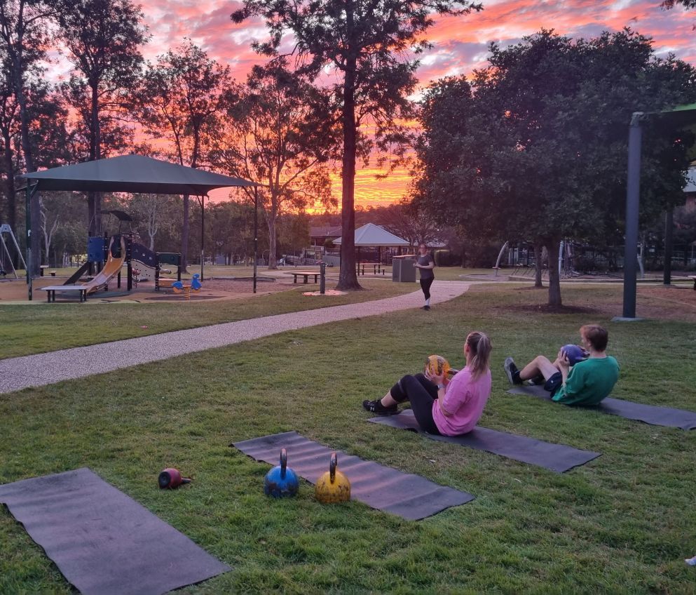 Woman Lifting Dumbbell — Fitness Trainer in Brisbane, QLD