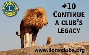 Lion and cub on a hilltop with text