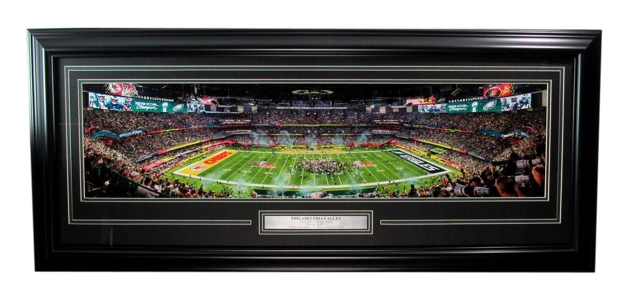 Panoramic framed photograph of a football stadium.