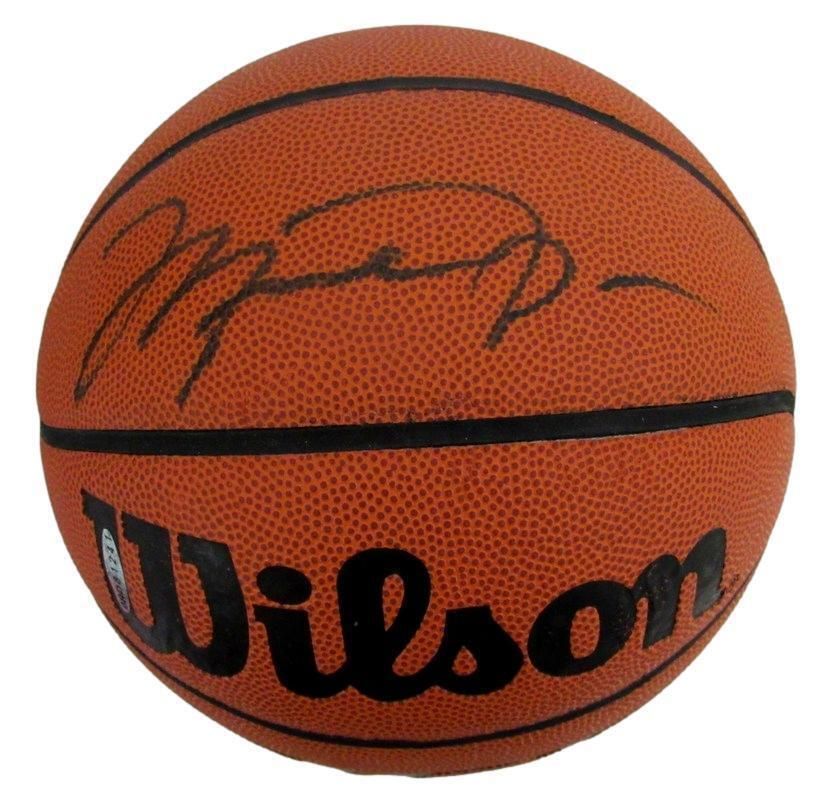 Basketball with Wilson logo and signature.