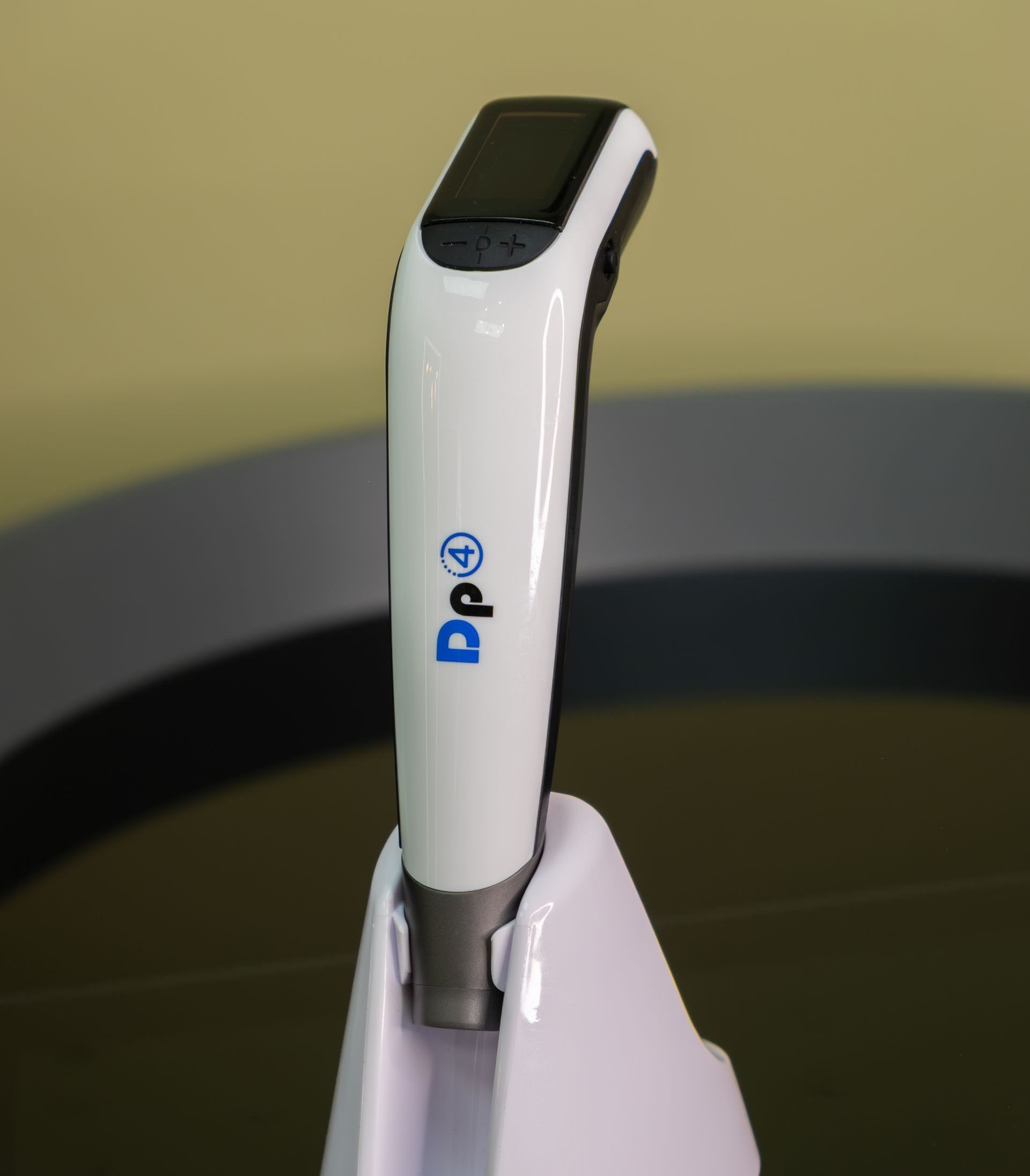 A white device with the word dp on it