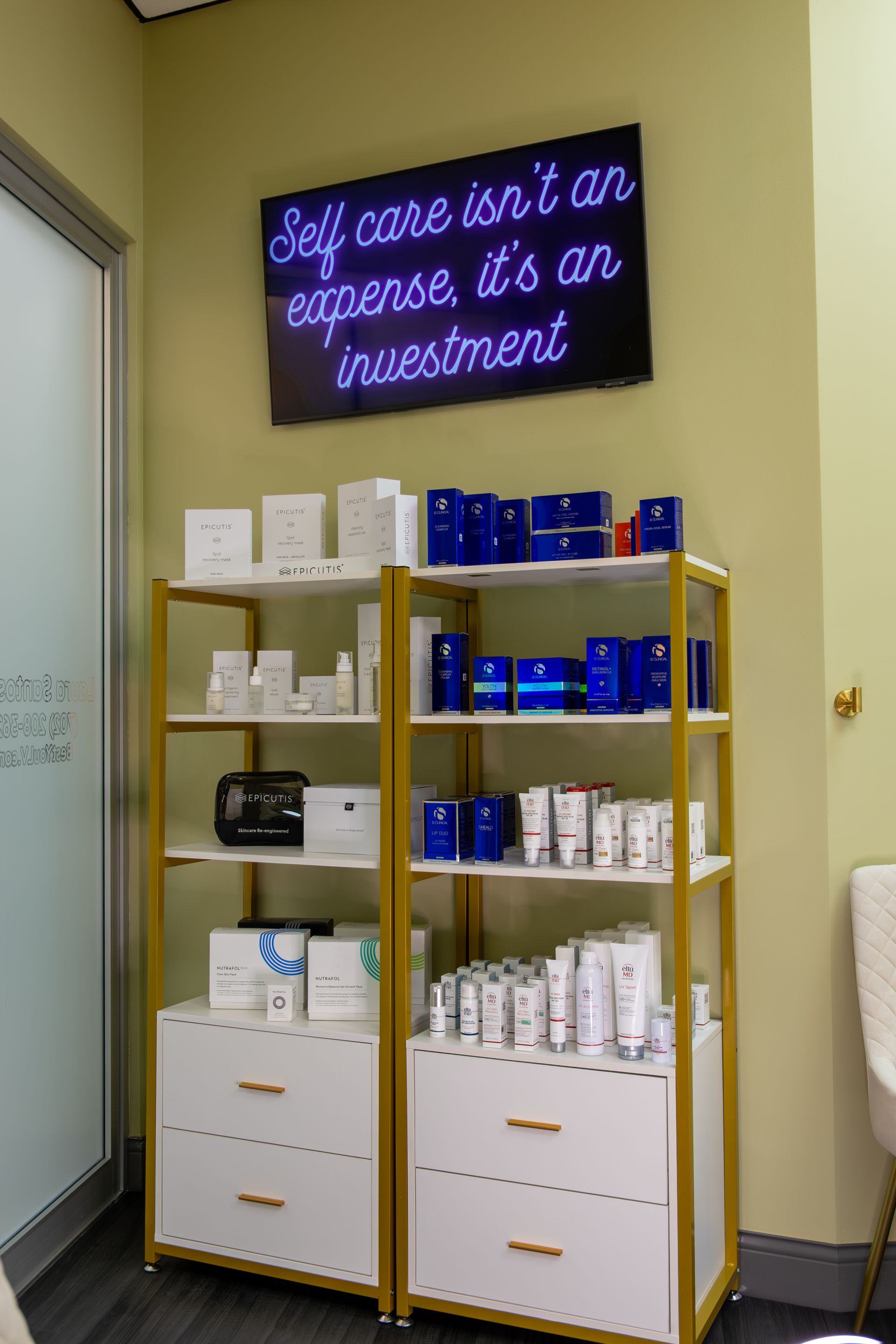 There is a sign on the wall that says `` self care isn 't an expense it 's an investment ''.